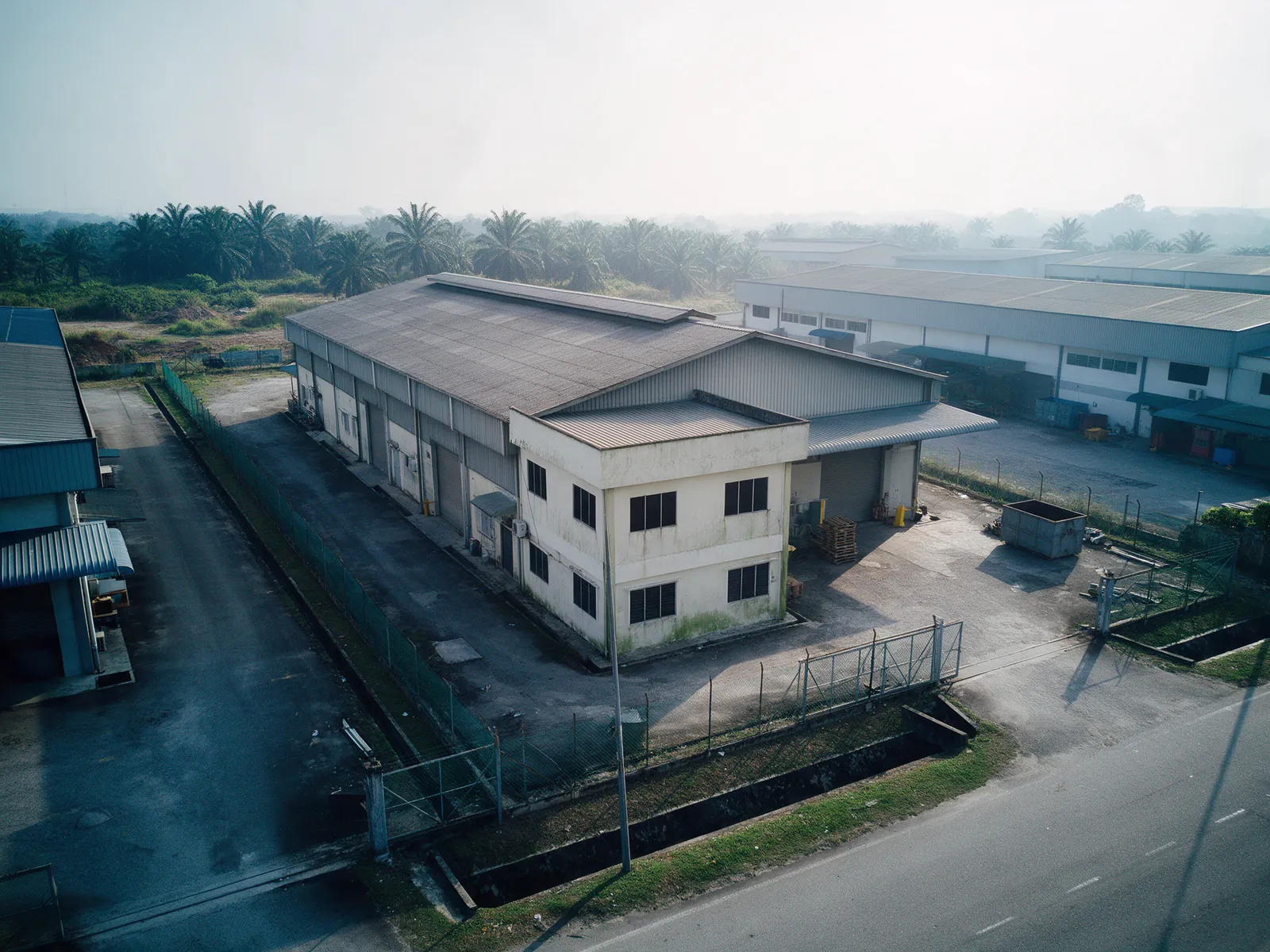 Illustration: aerial view of a detached factory on its own plot